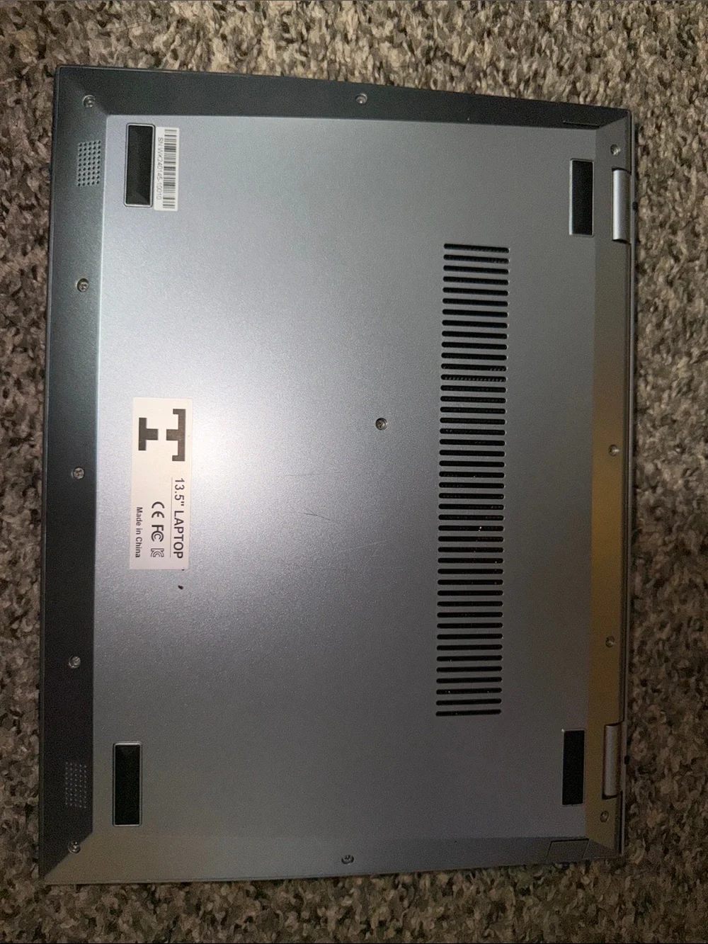 Silver Laptop with Intel Sticker - Sleek Portable Computer